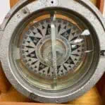 vintage ship compass close up of compass card and markings