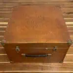 wooden storage box exterior with latches and handle