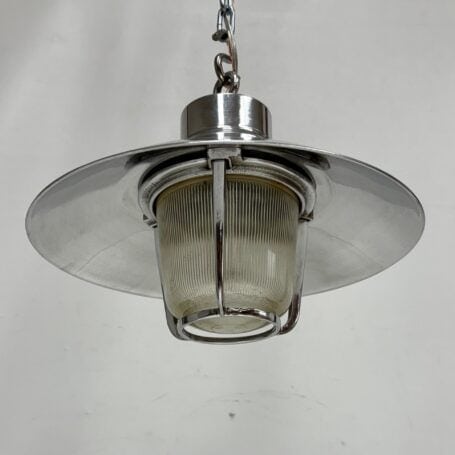 Aluminum Ceiling Light with Ribbed Globe and Rain Cap (3) Looking up at the aluminum ceiling light showcasing ribbed globe and chain-hung design