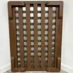 Back view of a nautical wooden grate with risers.