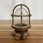 Vintage Brass Caged Marine Light straight-on front view