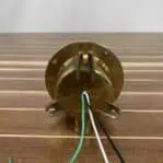 Close-up of wiring exiting base