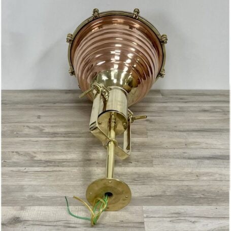 Ceiling mount and wiring view of large brass pendant light, with brass and copper finishes