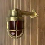Amber Glass Cast Brass Wall Light With Arm