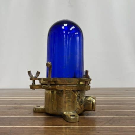 Nautical Ceiling Light With Blue Glass 03 Standard view of nautical ceiling light with blue glass and brass detailing