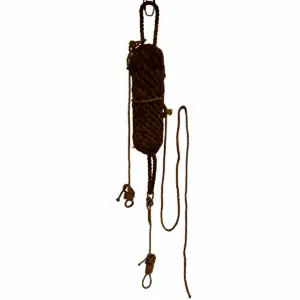 Vintage Natural Rope Boat Bumper hanging with attached rope lines