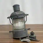 vintage oil lantern showing removed oil chamber and internal components