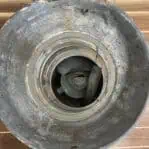 vintage oil lantern top view showing interior housing and lens opening