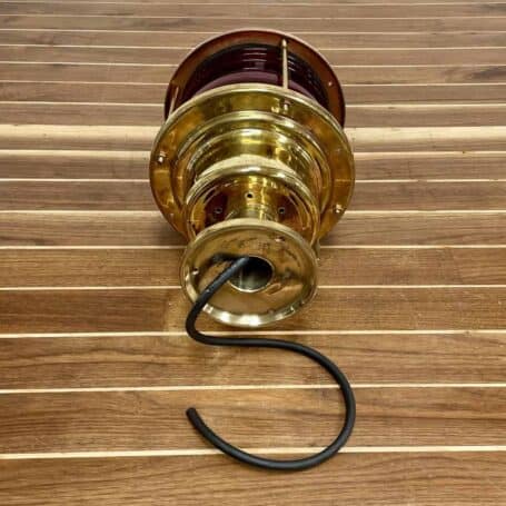 Bottom view of salvaged pier light with visible wiring for indoor or outdoor installation