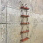 side view of 5 step orange ladder