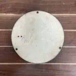 Back side of maritime wall clock with weathered finish