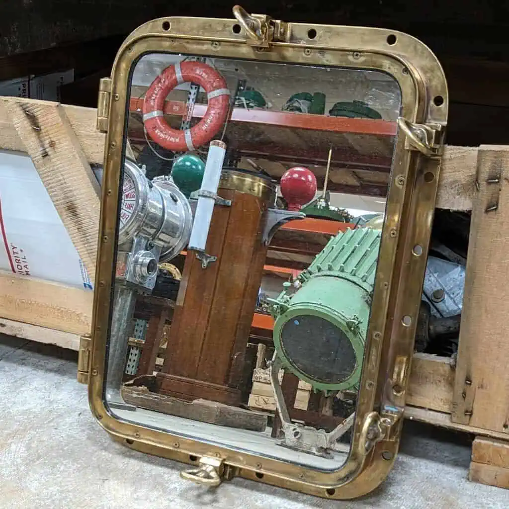 Authentic Brass 4 Dog Rectangular Porthole Mirror Lifestyle Image