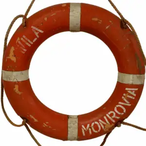 ront view of Salvaged Wila Ship Life Ring marked Wila Monrovia in white lettering