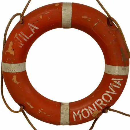 ront view of Salvaged Wila Ship Life Ring marked Wila Monrovia in white lettering
