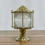 Outdoor Nautical Post Light with brass construction and detailed Fresnel lens, side view