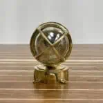 Bottom view of vintage brass wall sconce with brass junction box