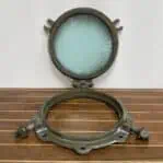 the Ships Porthole Window - Square Dogs opened