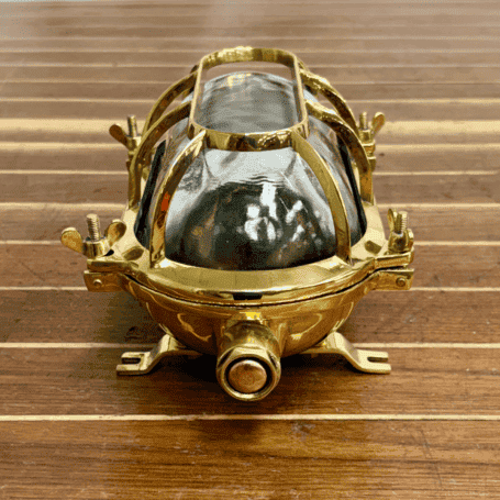 Oval Cast Brass Ceiling Or Wall Light (3) Clear oval glass marine light with brass protective cage
