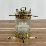 Back of Salvaged Brass Forcato-Verona Electric Ship lamp with wiring exiting base