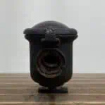 Rear view of Model T kerosene lamp showing missing bottom