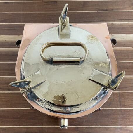 Copper and Brass Running Light -1974 Salvaged Marine Lantern with Clear Fresnel Lens 01 Copper and brass running light top view showing brass lid and wingnuts