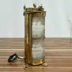 Side profile of brass marine navigation light with double-stacked Fresnel lens by Forcato-Verona