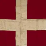 close-up of vintage Denmark ship flag showing fabric texture and color change