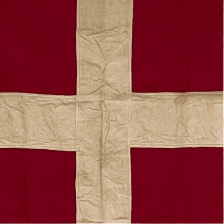 Vintage Denmark Ship Flag 02 close-up of vintage Denmark ship flag showing fabric texture and color change