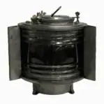Front view of vintage galvanized 225 degree running light with glass lens and mounting bracket