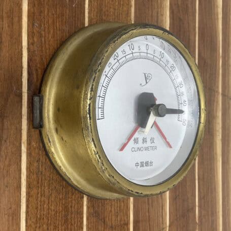 Vintage Marine Clinometer - Navigation Tool (3) Side view of brass nautical instrument with visible wear and mounting tabs