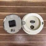 Open Showing Clock Mechanism: Open view of clock revealing battery-powered mechanism