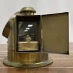 Side view of Cassens and Plath Brass Compass with oil chamber