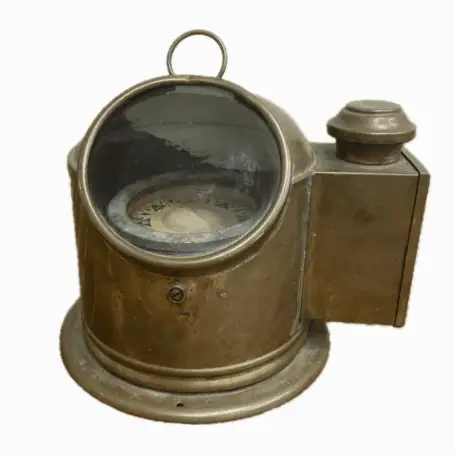 Vintage Sestrel compass with oil burner housing – front view