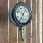 Ashcroft altitude gauge on wall
