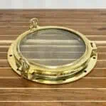 Side view brass port window