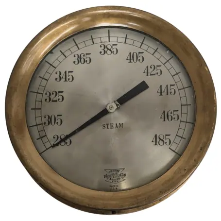 Front view of a 14.75-inch brass steam gage by Crosby Steamgage and Valve, Serial Number 985778