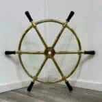 Front view of ship's wheel with wooden handles