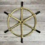 Overview of ship's wheel showing all wooden handles