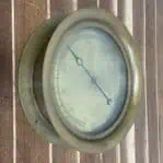 The Ashton Valve Brass Standard Test Gauge on a wall