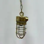 Side view of the Chain Hung Brass Engine Room Ceiling Light showing brass housing and chain.