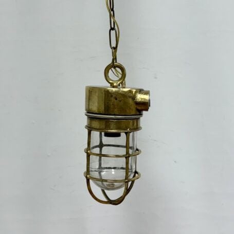 Chain Hung Brass Engine Room Ceiling Light (5) Side view of the Chain Hung Brass Engine Room Ceiling Light showing brass housing and chain.