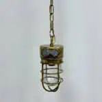 Back view of the Chain Hung Brass Engine Room Ceiling Light displaying its durable brass construction.
