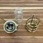 Disassembled view showing the cage, glass globe, and socket.