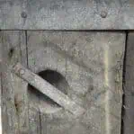 Top handle cutout on Liberty Ship hatch cover with splintering