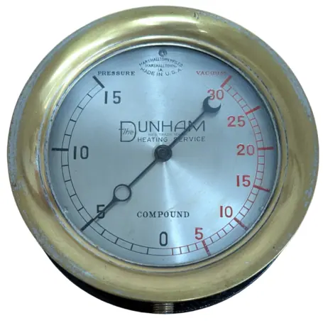 Front view of The Dunham Heating Service Compound Pressure Gauge