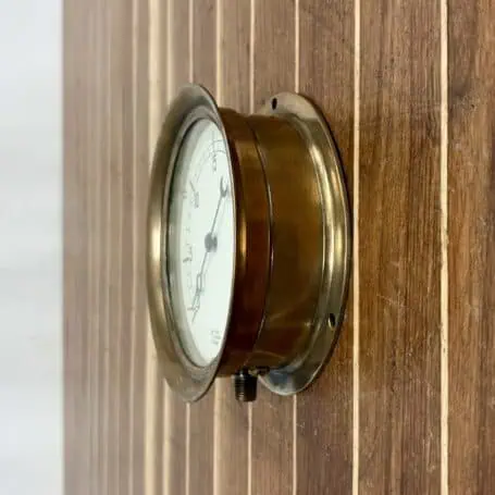 Front view of vintage brass gauge by Jas P Marsh & Company Chicago, 6.75-inch diameter.