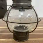 close up view of the bubbles in the glass of the Vintage Brass Wall Lantern