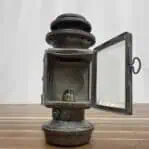 showing the door open on the Vintage Brass and Steel Kerosene Carriage Lantern