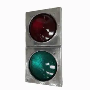 Front view of industrial signal light with red and green lenses