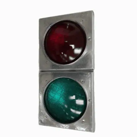 Front view of industrial signal light with red and green lenses